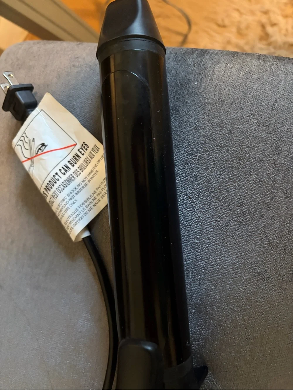 Bio Ionic Black long barrel curling iron/Styling Iron. 1.5 inch. Used one time.